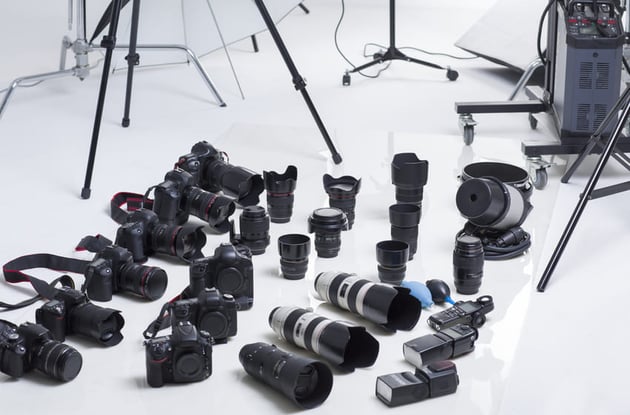 Many cameras and lenses in studio