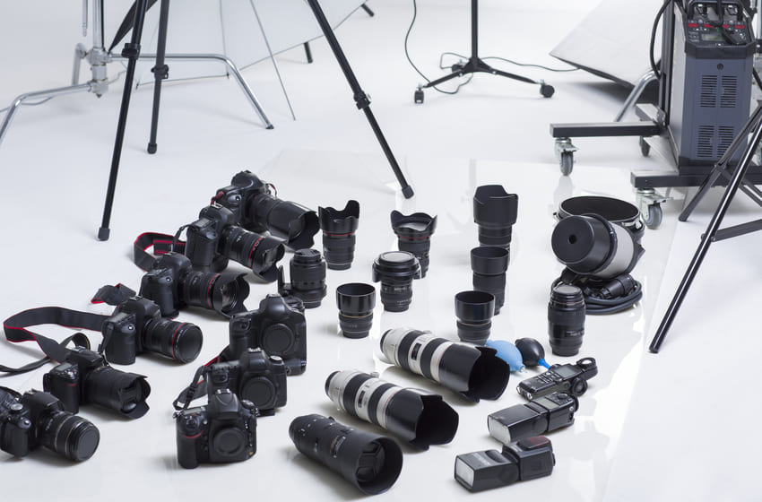 Many cameras and lenses in studio