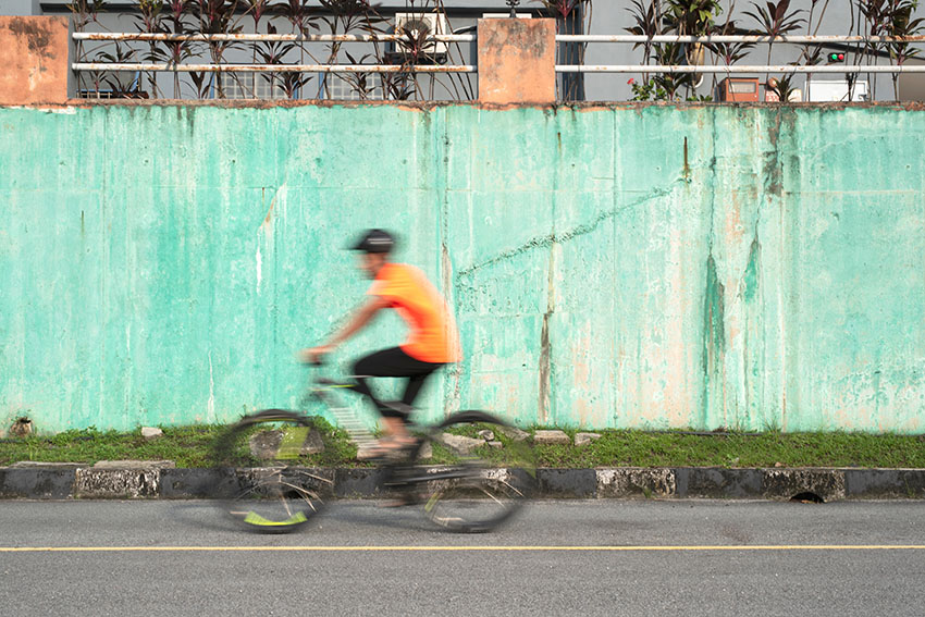 Man speeding on a bicycle