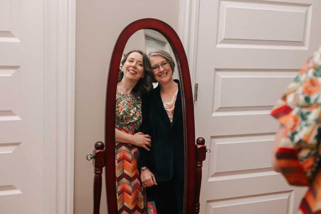 two women in a mirror